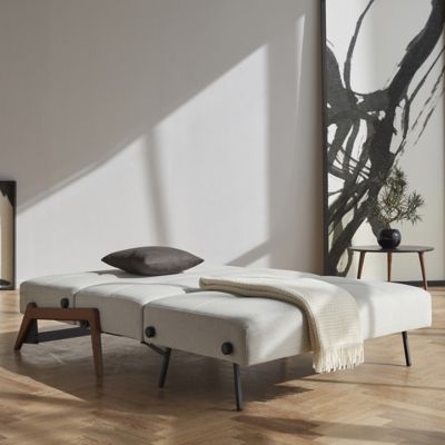 Shown in Mixed Dance Natural fabric color, Dark Stained Wood leg finish, in use