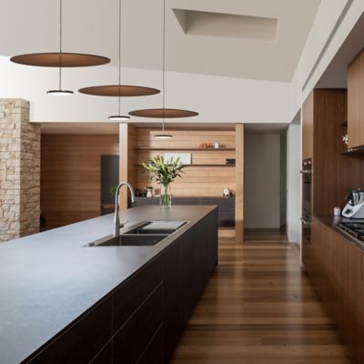 Shown in Walnut Shade color, Chrome finish, in use