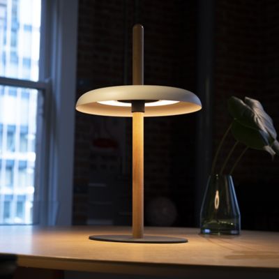 Shown in Oak finish, White Shade color, in use, lit