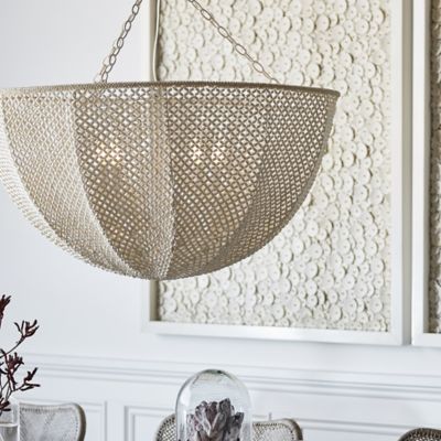 Shown in Cream finish, in use, lit