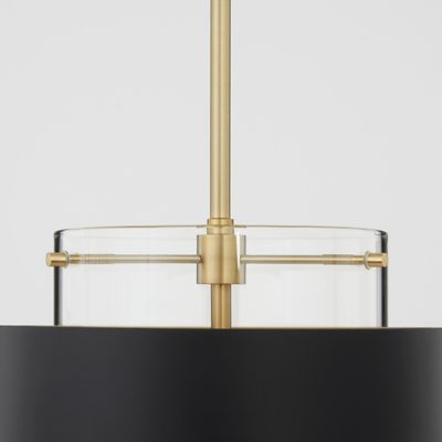 Shown in Matte Black with Aged Brass finish, Medium size, unlit