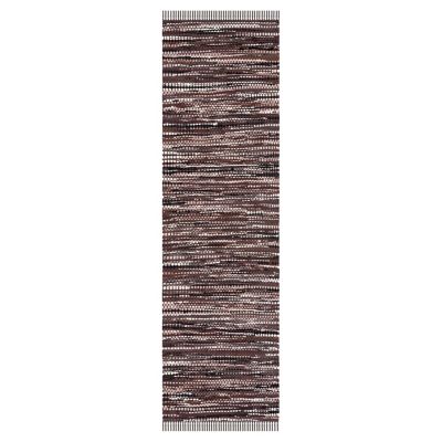 Woven Song Area Rug