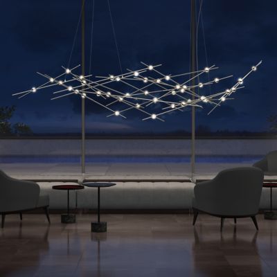 Shown in Satin Nickel finish, Clear Faceted shade color, in use