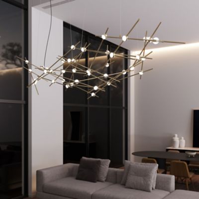 Shown in Satin Brass finish, White Optical shade color, in use