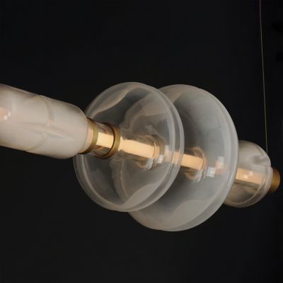 Shown in Gold with White Glass finish, Detail view