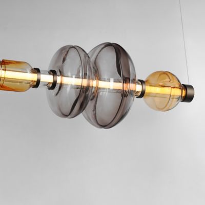 Shown in Gunmetal with Smoked Grey and Warm Amber Glass finish, Detail view