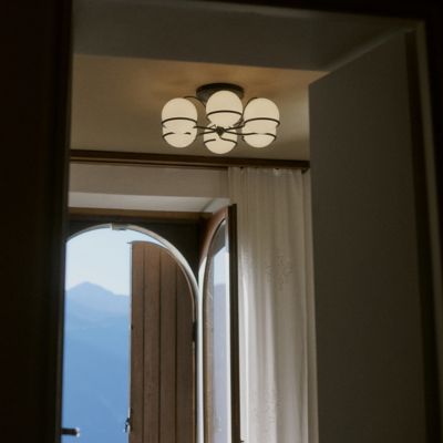 Shown in Black finish, 6 lights, in use, lit