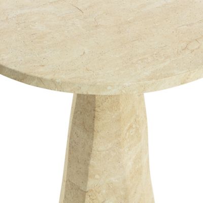 Light marble bar table with a tapered base.