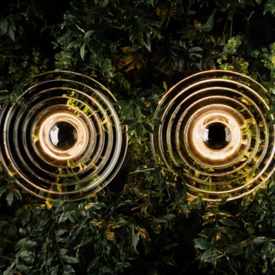 Shown in Clear finish, Medium size, in use, lit