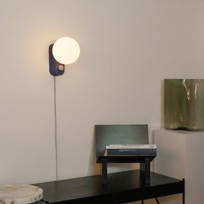 Shown in Blue finish, lit, in use