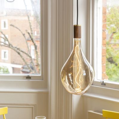 Shown in Oak finish, Hardwired Installation, Large size, lit, in use
