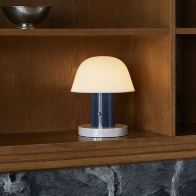 Shown in Twilight and Sand finish, in use, lit