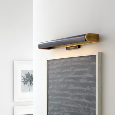 Shown in Hand-Rubbed Antique Brass with Bronze finish, 24 inch, lit, in use