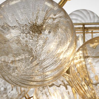 Shown in Gild with Gold Fleck finish, detail view, lit