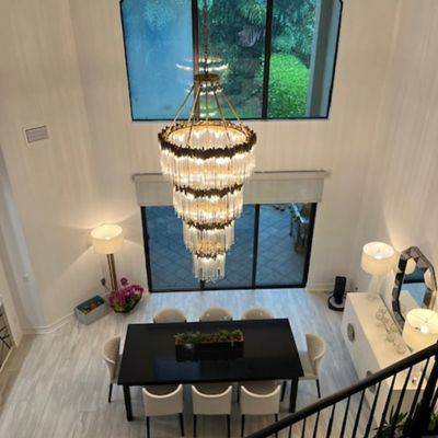Shown in Matte Black/French Gold finish, 4 tiers, in use