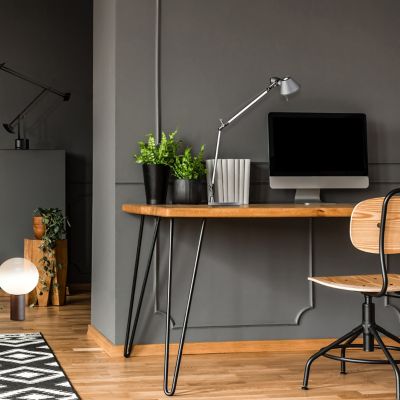 Shown in Aluminum finish, Table Base, in use