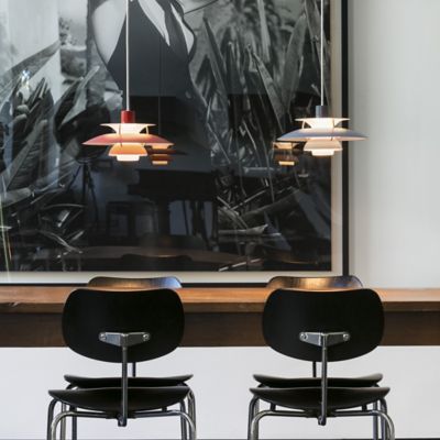 https://images.lumens.com/is/image/Shown in Hues of Orange and Monochrome Oyster Grey Shade color, in use