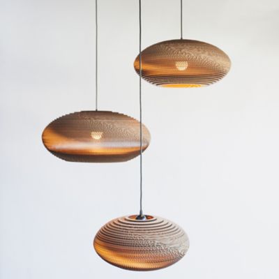 Shown in Natural finish, lit, in use